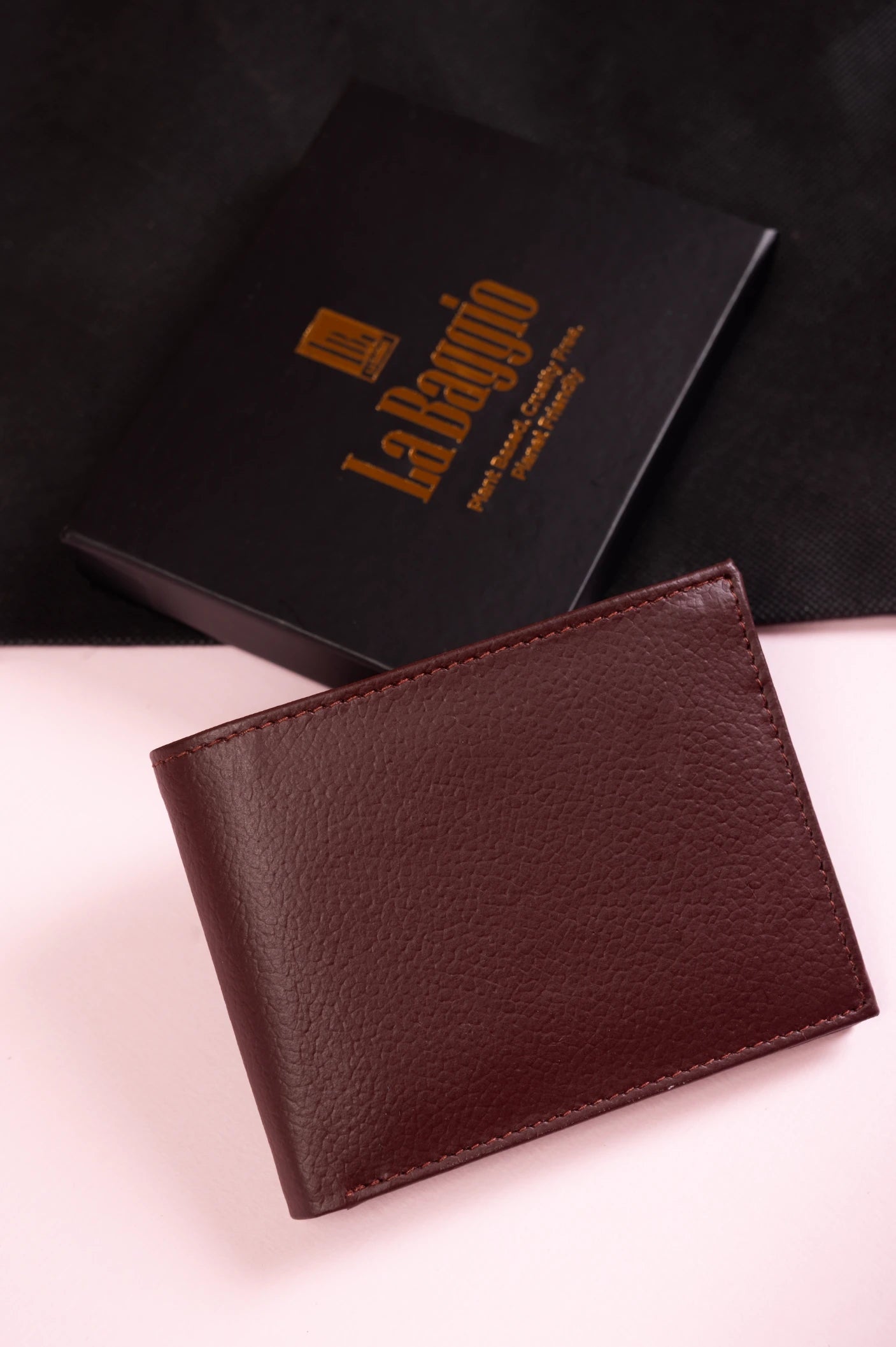 Brown vegan leather wallet for men with 'La Baggio' branding on a black background