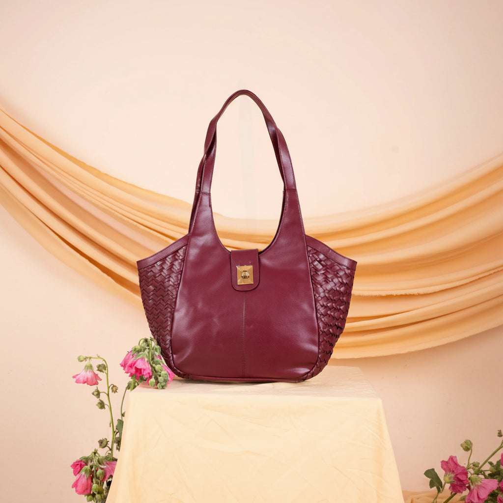 Purple vegan handbag for women on a yellow tablecloth with a floral arrangement against a beige curtain background